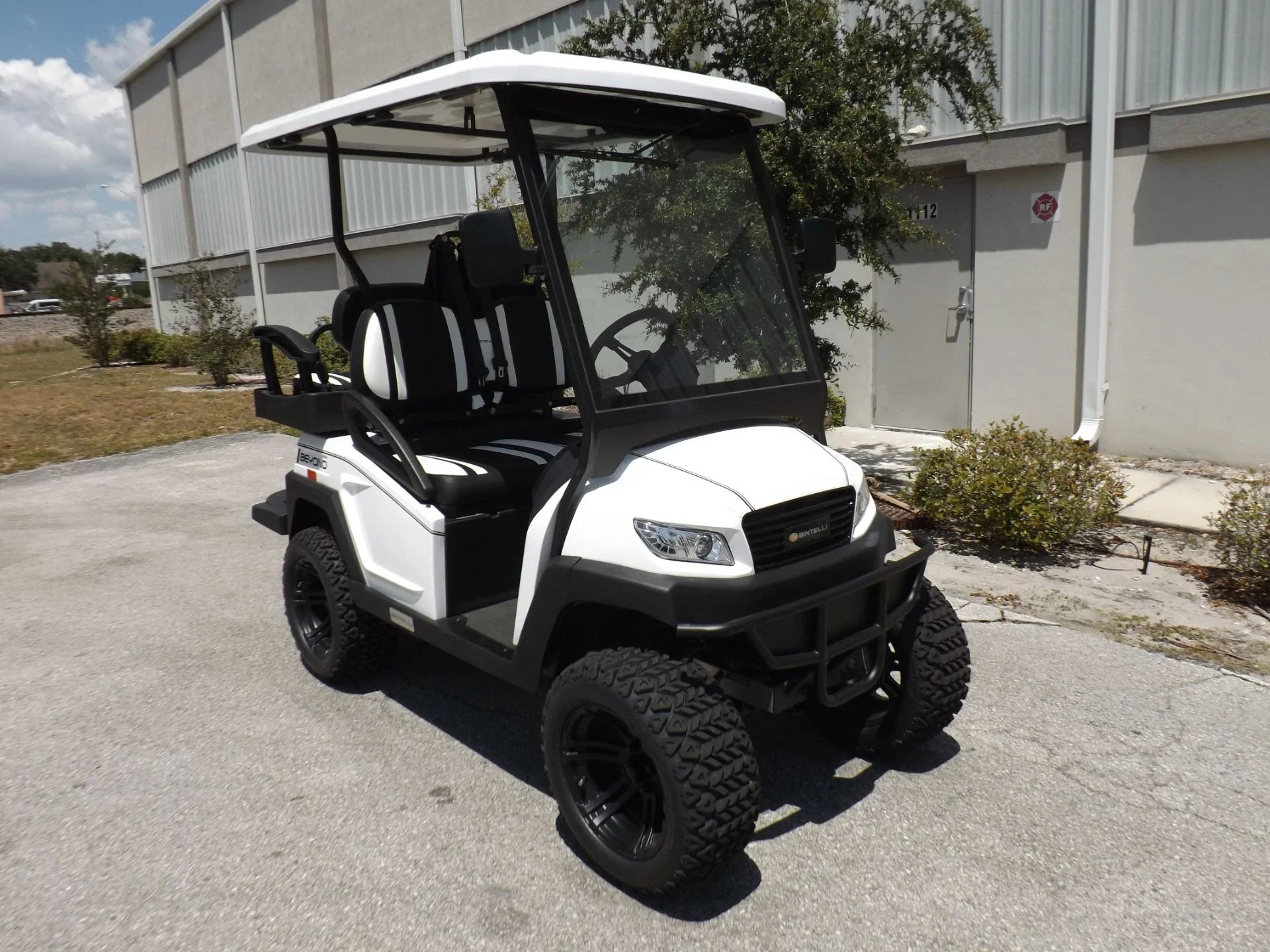 White 2022 Bintelli BEYOND 4P Lifted Golf Cart for Sale image 0