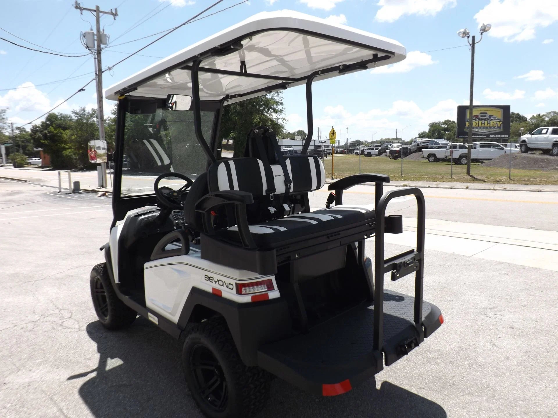 White 2022 Bintelli BEYOND 4P Lifted Golf Cart for Sale image 4